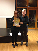 Ella Butler receiving her award