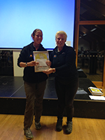 Ellie Rose receiving her award for significant progress