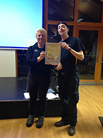 Sam Astill receiving his award for significant progress and development