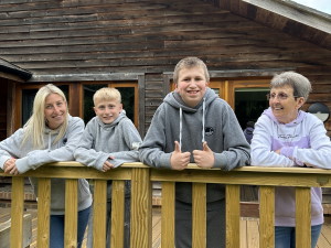 A family enjoying one of our lodges