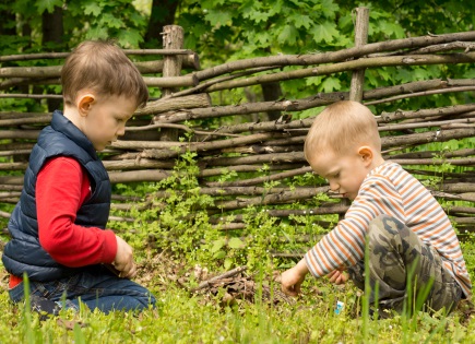 Two children playing outside