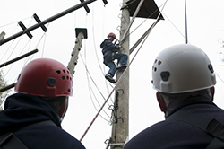 Climbing up to the Triple Trapeze at High Ashurst